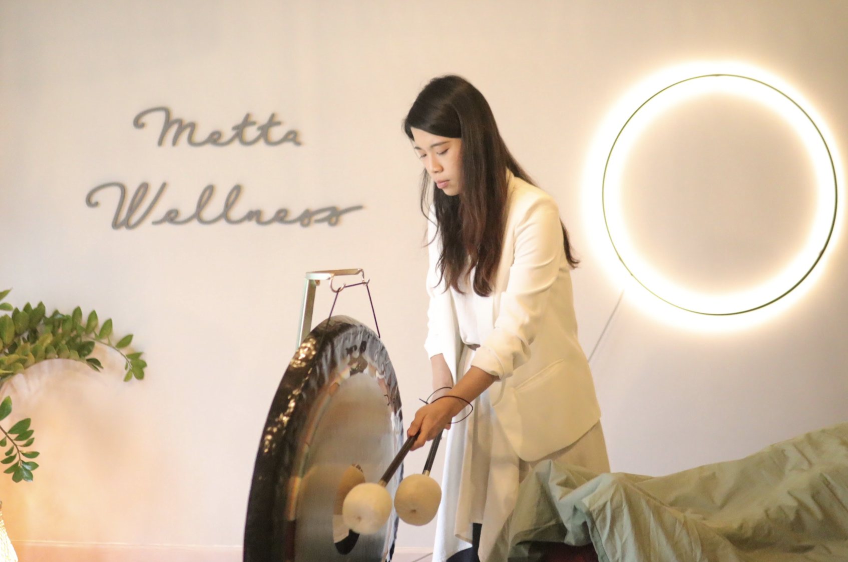 Helen playing the gong